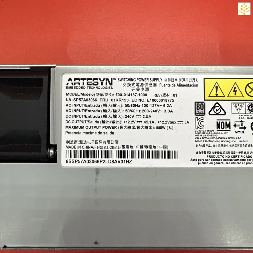 Power supply unit from Artesyn with technical specifications and warning labels.