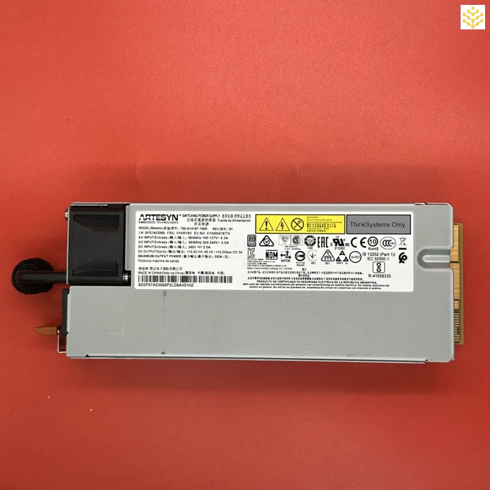 Computer power supply unit with manufacturer labels and safety warnings.