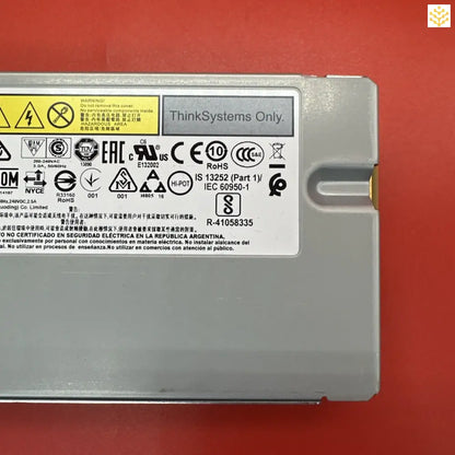 Computer power supply unit with various certification and safety labels.