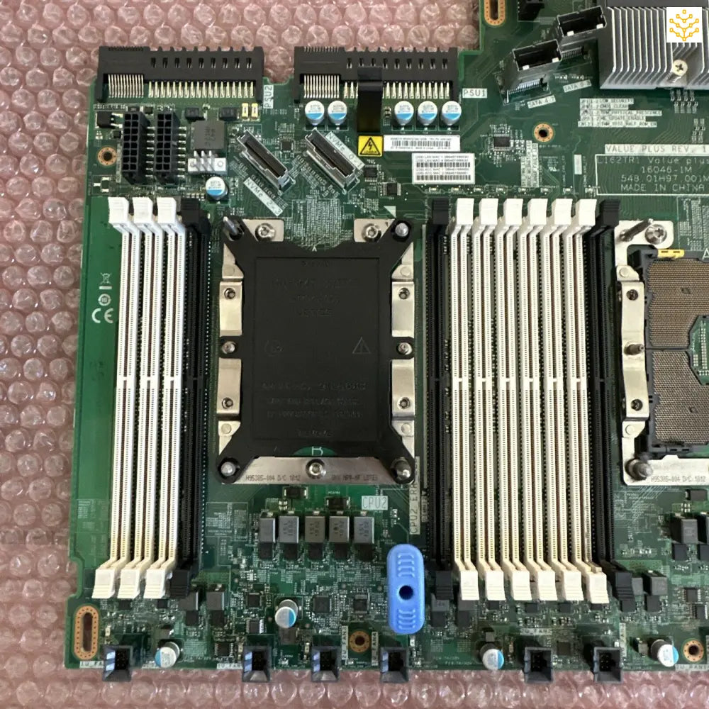 Computer motherboard with CPU socket and RAM slots visible.