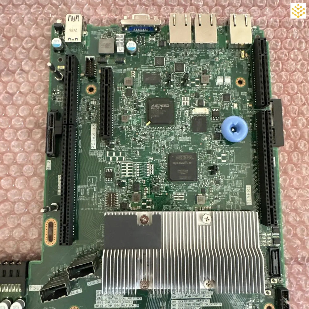 Computer motherboard with various ports, chips, and components visible.