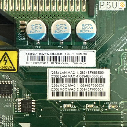 Circuit board with electronic components and identification labels.