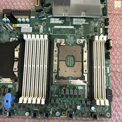 Server motherboard with CPU socket and RAM slots visible.