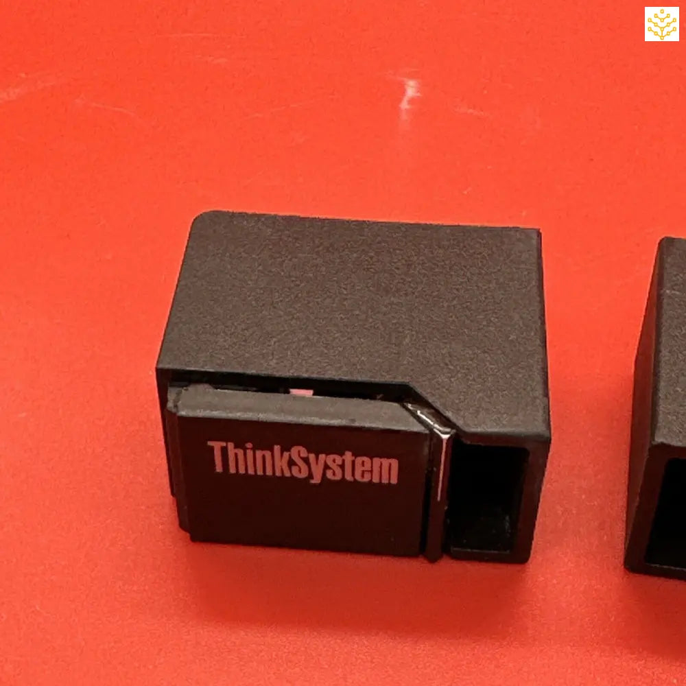 Black electronic device labeled ’ThinkSystem’ with a rectangular shape and visible ports.