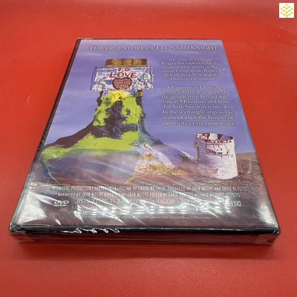 DVD case showing a castle tower on a green hill against a purple background.