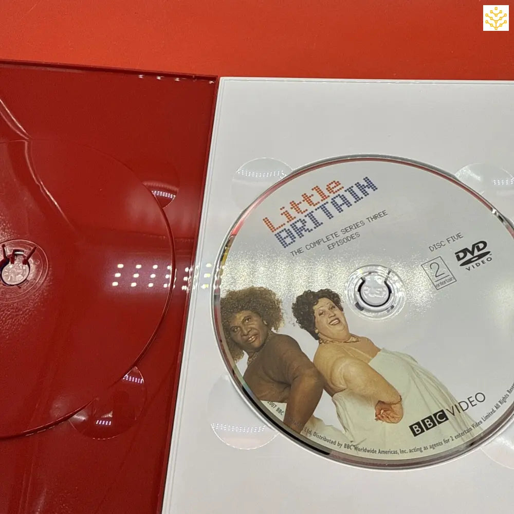 DVD disc of Little Britain in a red case.