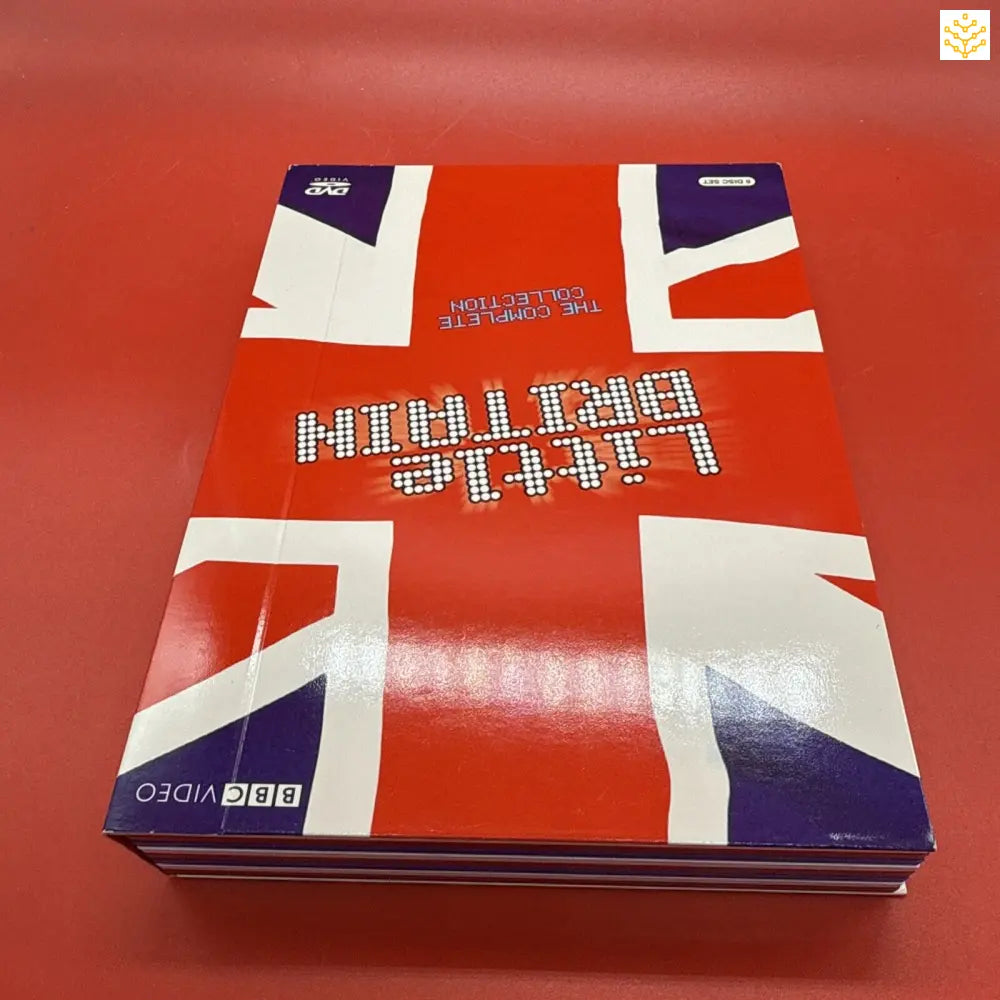 Red, white and blue Union Jack-themed textbook or study guide with ’Little Britain’ text.