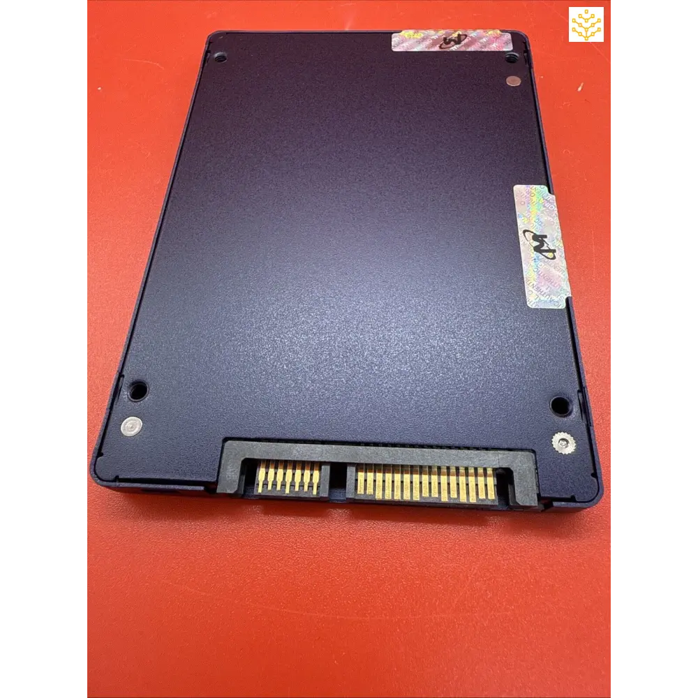 Black SATA solid state drive (SSD) with visible data connector pins.