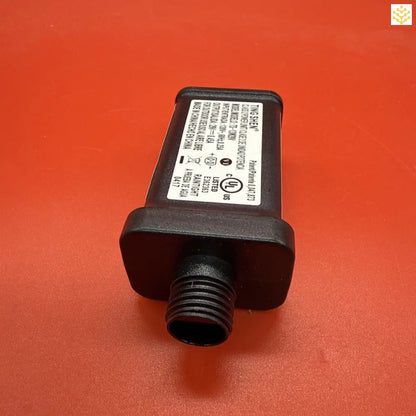 Black electronic pressure sensor with a manufacturer’s label.