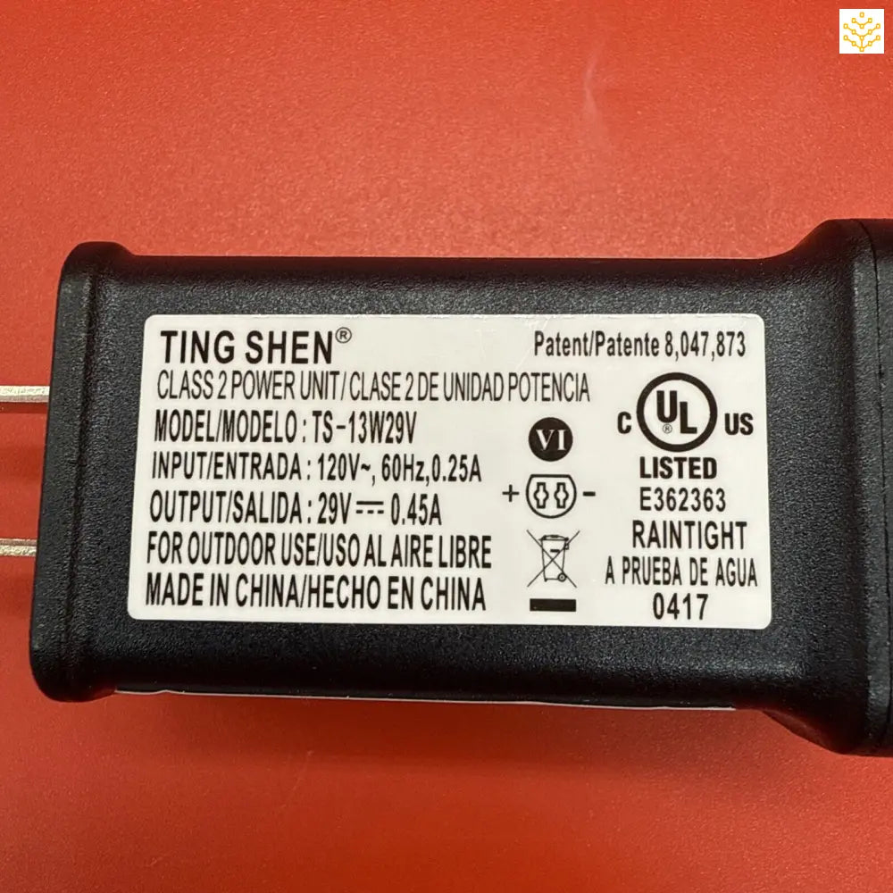 Power adapter with specifications showing input 120V and output 24V.