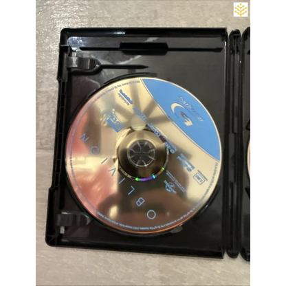 Compact disc (CD) inside an open plastic case.