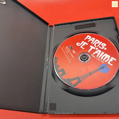 DVD disc of ’Paris, Je T’aime’ in an open black case.