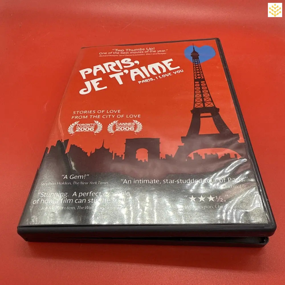 DVD case of ’Paris, Je T’aime’ featuring the Eiffel Tower silhouette against a dark skyline.