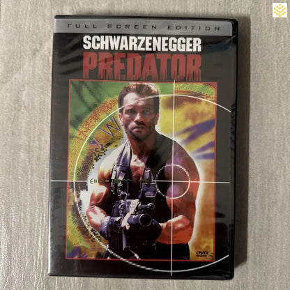 DVD case of the movie ’Predator’ featuring a soldier holding a weapon within a targeting reticle design.