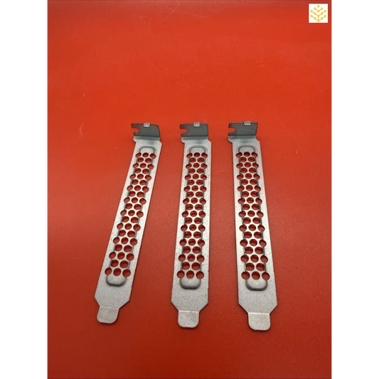 Three perforated metal PCIe slot covers with hexagonal hole patterns.