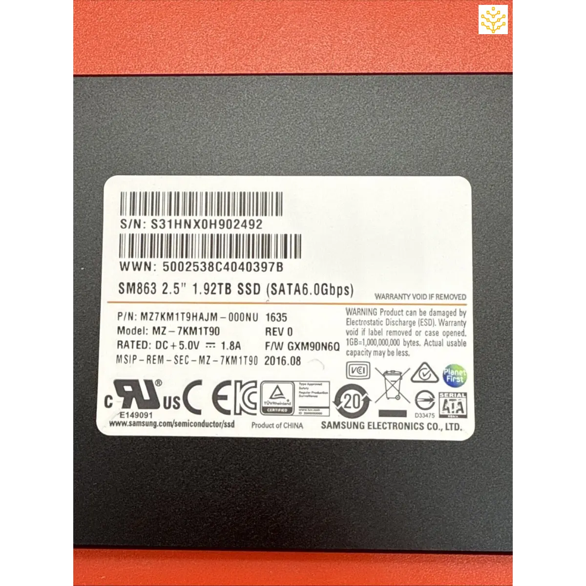 Samsung solid-state drive (SSD) with product information label.