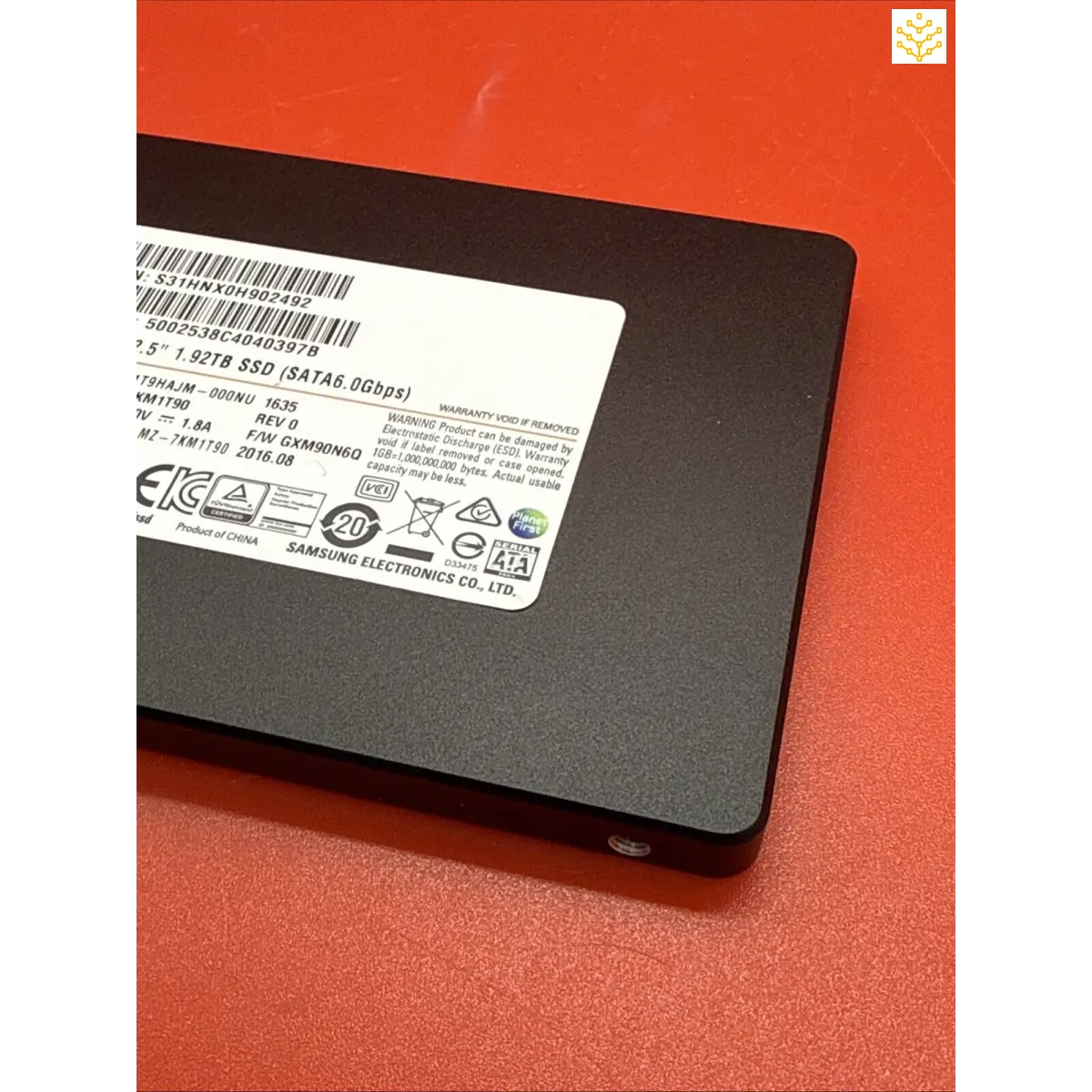 Solid-state drive (SSD) with a product label visible on its surface.