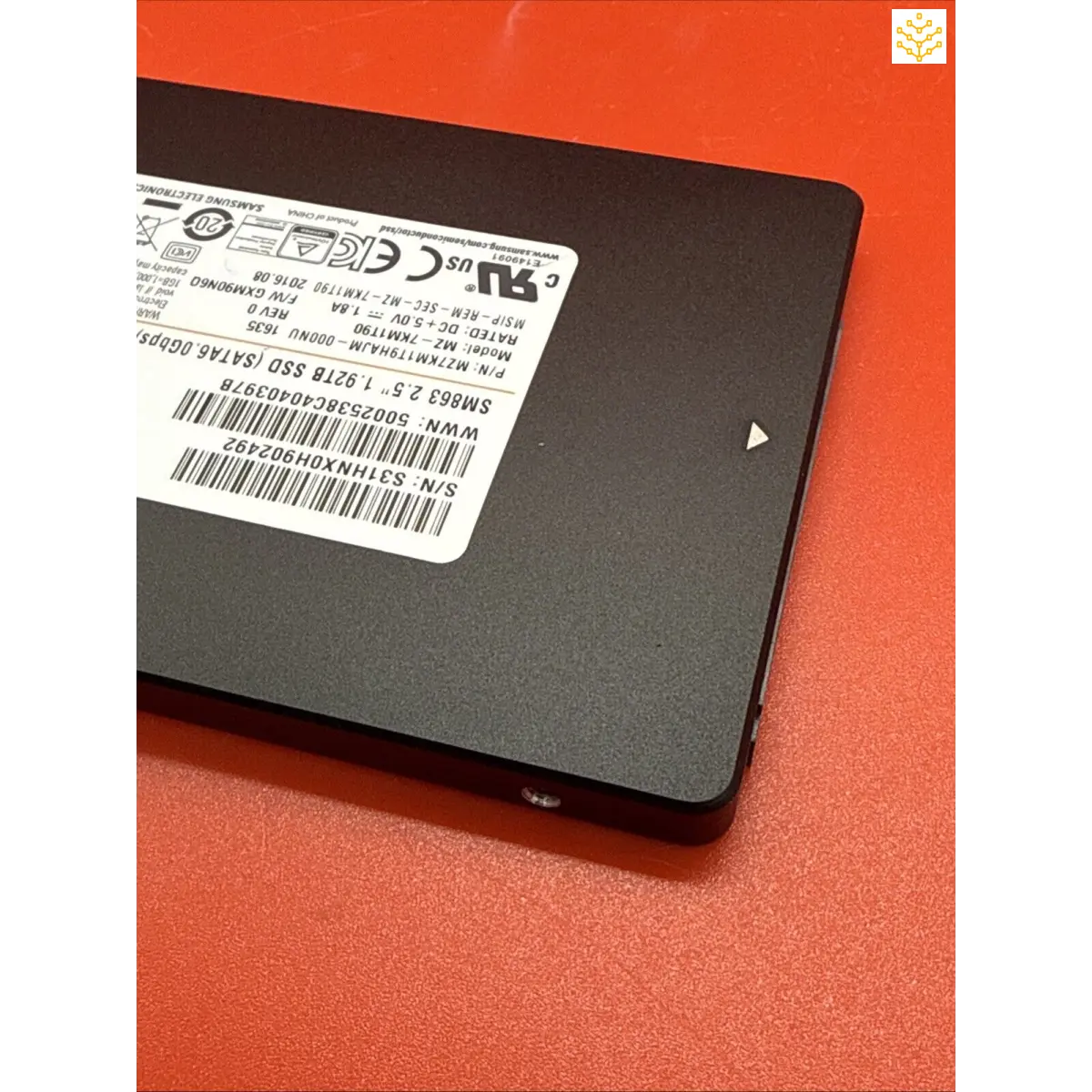 Solid-state drive (SSD) with a product label visible on its surface.