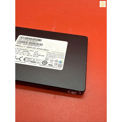 Solid-state drive (SSD) with a product label visible on its surface.