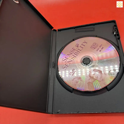 DVD disc inside a black plastic case.