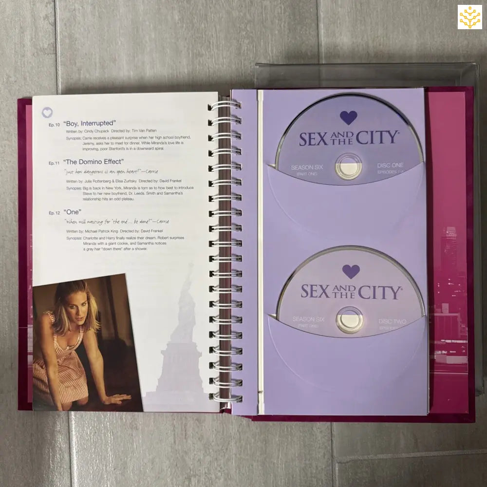 DVD collection book or media organizer containing Sex and the City discs.