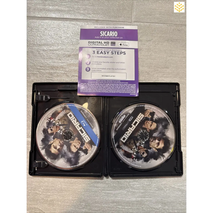 DVD case containing two discs for the movie ’Sicario’ with a digital code insert on top.