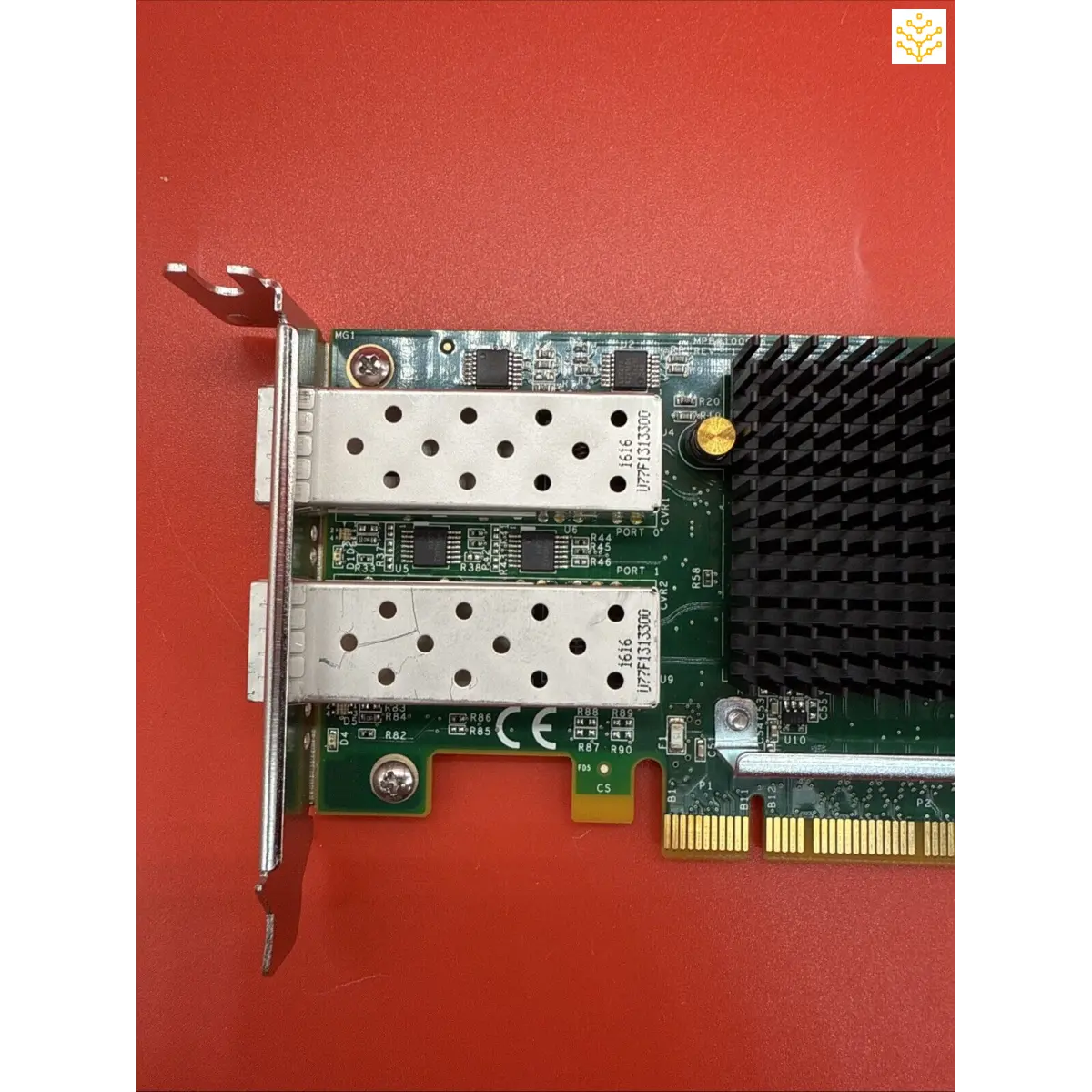 Network interface card with dual SFP ports and a heat sink.