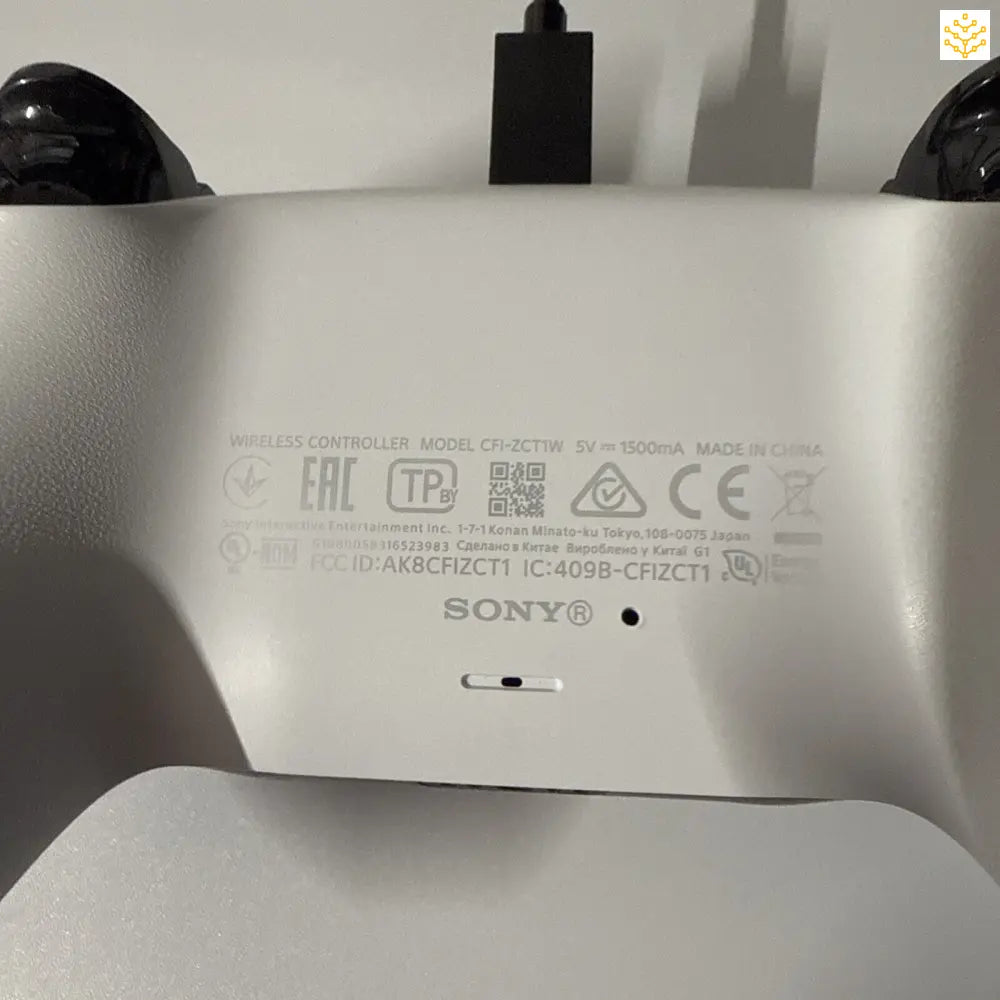 PlayStation 5 DualSense controller showing its certification markings.