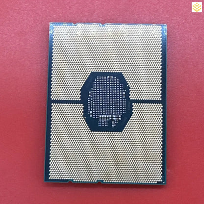 Computer processor chip with visible contact pads and central processing area.