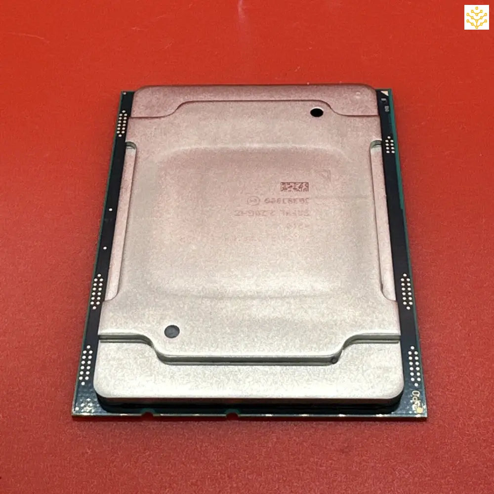 Computer processor or CPU chip with a metal heat spreader on top.