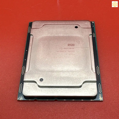 Computer processor or CPU chip with a metal heat spreader on top.