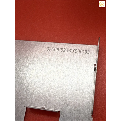 Metal panel or plate with an alphanumeric code engraved or printed on it.