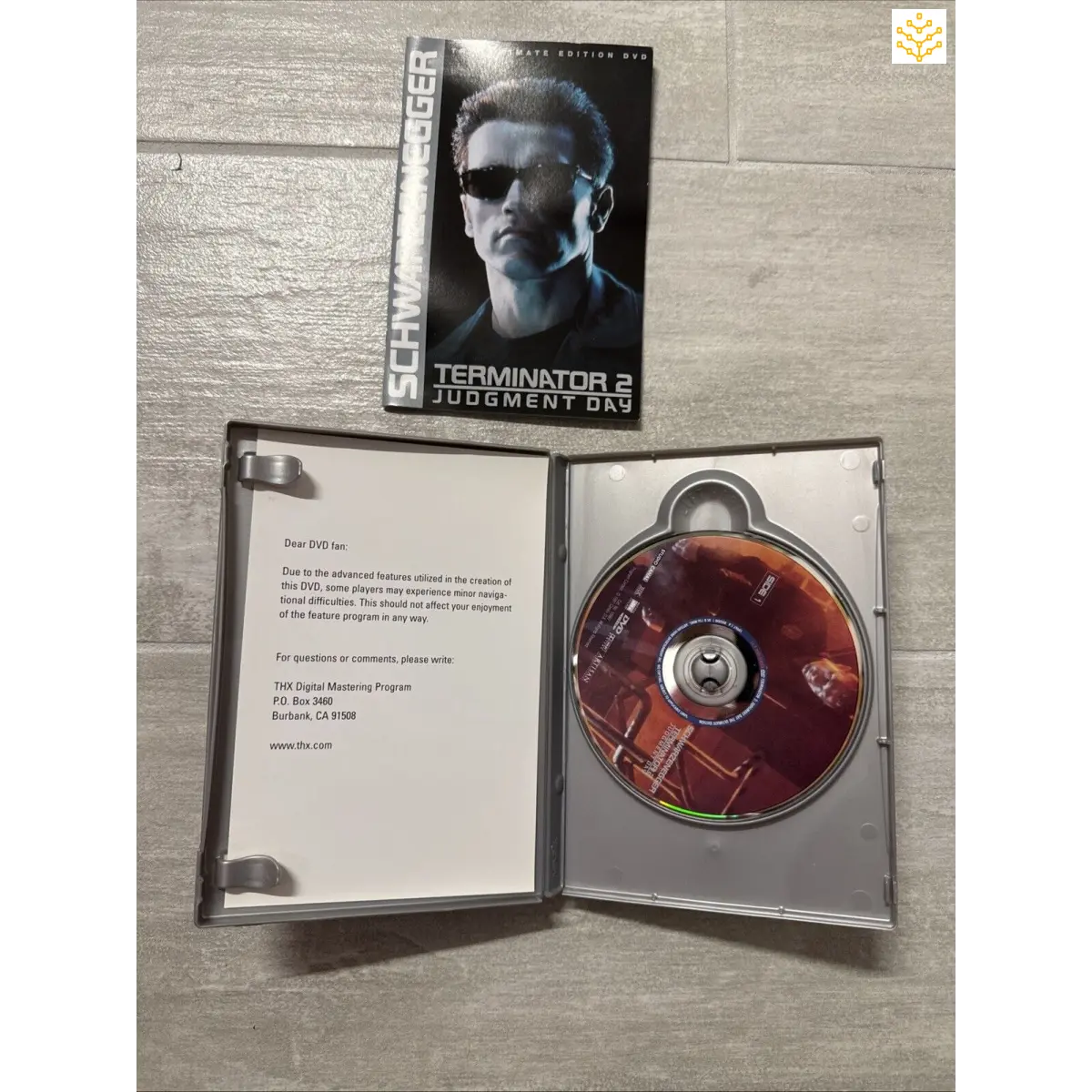 DVD case of the movie ’Terminator 2: Judgment Day’ with the disc visible inside.