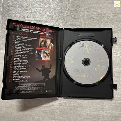 Open DVD case displaying ’The Court of Monte Cristo’ soundtrack with track listing and disc visible.