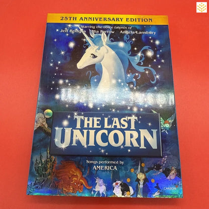 25th Anniversary Edition DVD cover of ’The Last Unicorn’ animated film featuring a white unicorn against a starry background.