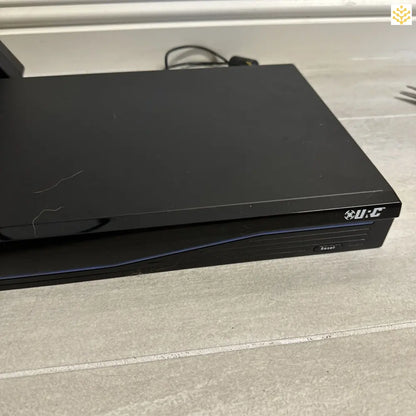 Black Blu-ray or DVD player with a slim profile.