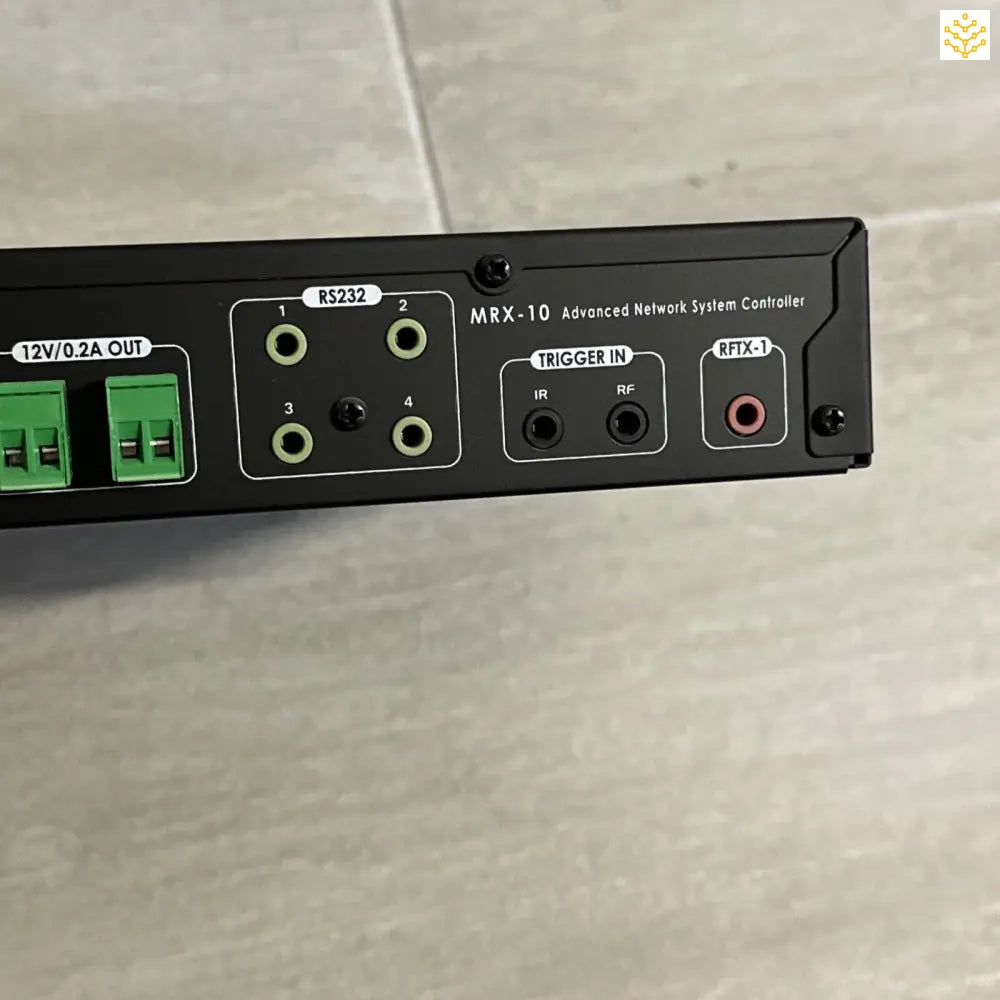 Audio equipment panel with various input and output ports.