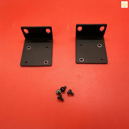 Two black metal mounting brackets with accompanying screws.