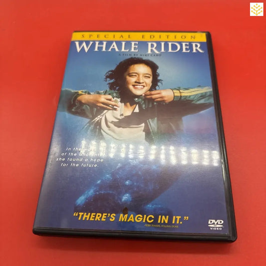 DVD case of the movie ’Whale Rider’ featuring a split image of a person above water and a whale below.