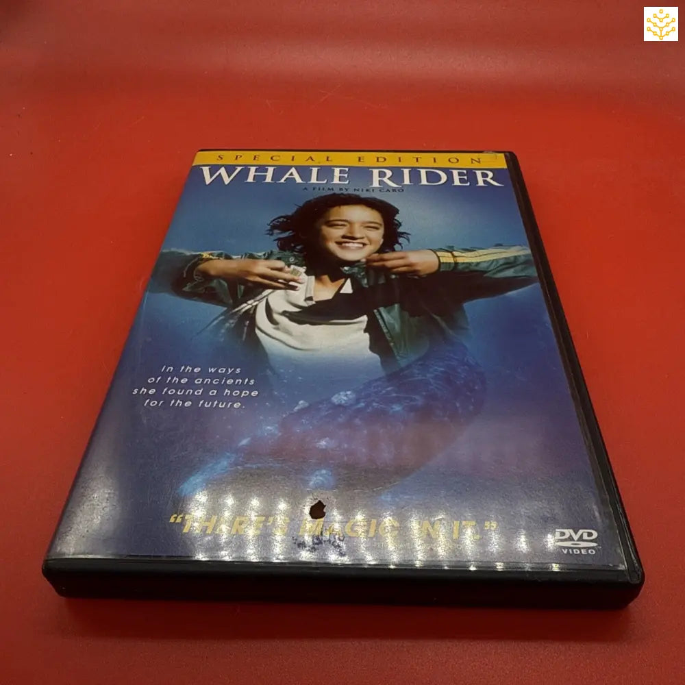 DVD case of the movie ’Whale Rider’ featuring a person with outstretched arms against a blue background.