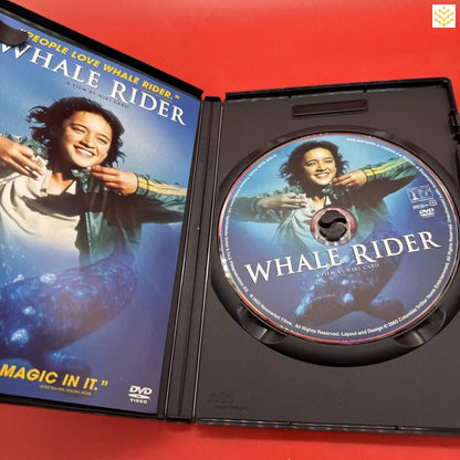 DVD case and disc of the movie ’Whale Rider’ opened to display both cover art and disc.